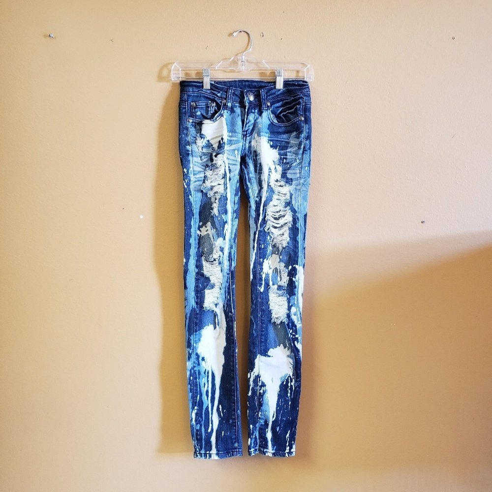 Machine distressed skinny jeans